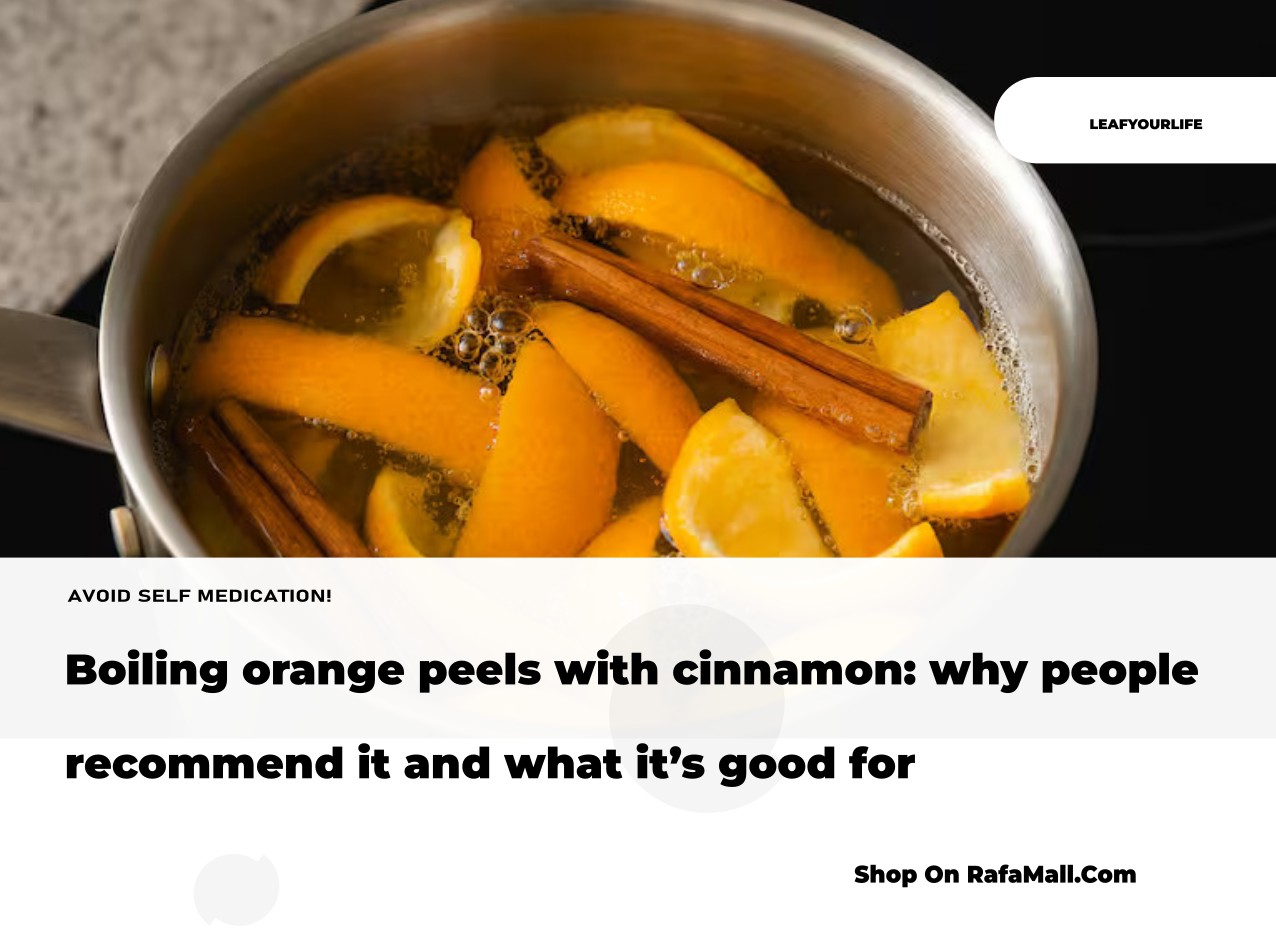 Fresh orange peels and cinnamon sticks simmering in a pot of water on a stove, releasing a natural aroma into the home.